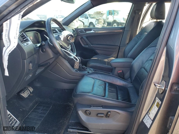 2020 Volkswagen Tiguan SEL Premium R-Line with VIN 3VV4B7AXXLM068664, listed as a Copart auction lot 83243264 with 132,734 mi miles and Salvage Title. Bid and sale history available at carsss.com. Image 7.