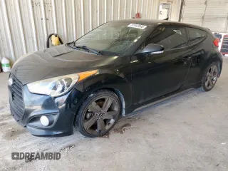 2014 Hyundai Veloster Turbo с VIN KMHTC6AEXEU209694, выставлен на аукционе Copart как лот 62902095 с пробегом Не указан миль и Списание • Salvage title. История ставок и продаж доступна на DreamBid. Изображение 1.