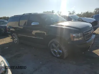 2011 Chevrolet Suburban LTZ with VIN 1GNSCKE01BR275919, listed as a Copart auction lot 46934455 with 247,841 mi miles and Clean Title. Bid and sale history available at carsss.com. Image 4.