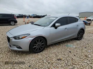 2018 Mazda 3 Touring z VIN 3MZBN1L30JM275241, wystawiony jako Copart lot #52041245 z przebiegiem 60 189 mil mil oraz Szkoda całkowita • Salvage title. Historia ofert i sprzedaży dostępna na DreamBid. Obrazek 1.