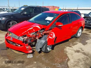 2015 Ford Focus SE z VIN 1FADP3F24FL283927, wystawiony jako IAAI lot #41755250 z przebiegiem Nie podano mil oraz . Historia ofert i sprzedaży dostępna na DreamBid. Obrazek 17.