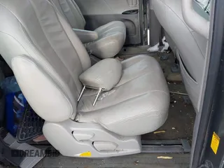 2014 Toyota Sienna L with VIN 5TDZK3DC2ES429684, listed as a IAAI auction lot 41529309 with 112,190 mi miles. Bid and sale history available at carsss.com. Image 8.