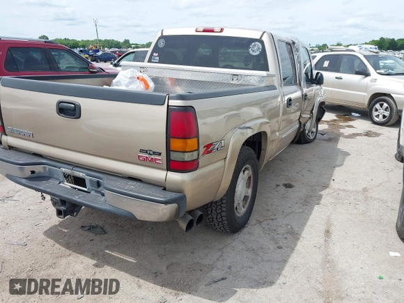 2004 GMC Sierra 1500 SLE z VIN 2GTEK13T841413502, wystawiony jako IAAI lot #42226796 z przebiegiem 192 481 mil mil oraz . Historia ofert i sprzedaży dostępna na DreamBid. Obrazek 4.