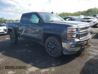 2015 Chevrolet Silverado 1500 LT with VIN 1GCVKREH4FZ197651, listed as a Copart auction lot 55634725 with Not Provided miles and Salvage Title. Bid and sale history available at DreamBid. Image 4.