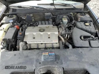 1999 Cadillac Seville z VIN N0V1N, wystawiony jako Copart lot #72249294 z przebiegiem Nie podano mil oraz Nie do naprawy • Non repairable. Historia ofert i sprzedaży dostępna na DreamBid. Obrazek 11.