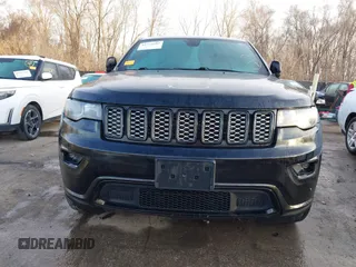 2019 Jeep Grand Cherokee Laredo E with VIN 1C4RJFAG4KC608897, listed as a IAAI auction lot 41771603 with 106,525 mi miles and . Bid and sale history available at DreamBid. Image 6.