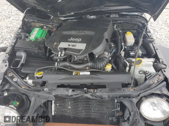 2015 Jeep Wrangler Rubicon with VIN 1C4HJWCG0FL755717, listed as a Copart auction lot 61375435 with 153,207 mi miles and Salvage title. Bid and sale history available at DreamBid. Image 12.