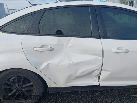 2018 Ford Focus SE with VIN 1FADP3F23JL242066, listed as a IAAI auction lot 41804512 with 99,662 mi miles. Bid and sale history available at carsss.com. Image 6.