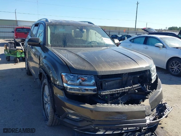 2019 Volkswagen Atlas 3.6L V6 SE w/Technology with VIN 1V2WR2CA0KC572590, listed as a IAAI auction lot 41083846 with 60,232 mi miles. Bid and sale history available at carsss.com. Image 1.