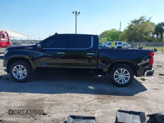 2024 Chevrolet Silverado 1500 LTZ with VIN 1GCUDGE81RZ298421, listed as a IAAI auction lot 41775039 with 6,900 mi miles and . Bid and sale history available at DreamBid. Image 14.