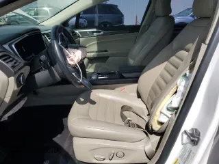 2017 Ford Fusion Hybrid SE with VIN 3FA6P0LU8HR142229, listed as a Copart auction lot 57079925 with 118,629 mi miles and Salvage title. Bid and sale history available at DreamBid. Image 7.