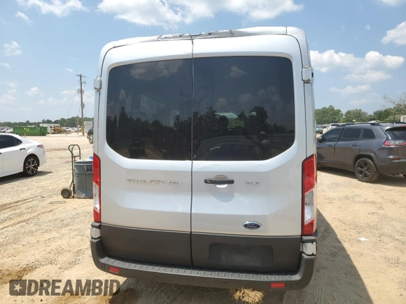 2022 Ford Transit Passenger XL z VIN 1FBAX2C86NKA19696, wystawiony jako Copart lot #66083354 z przebiegiem 40 332 mil mil oraz Szkody całkowita. Historia ofert i sprzedaży dostępna na DreamBid. Obrazek 6.