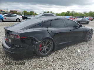 2023 Tesla Model S Plaid with VIN 5YJSA1E67PF511354, listed as a Copart auction lot 56648975 with 69,002 mi miles and Salvage title. Bid and sale history available at DreamBid. Image 3.