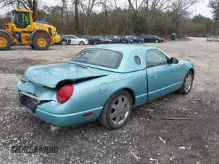 2002 Ford Thunderbird Hardtop Premium with VIN 1FAHP60A12Y105103, listed as a IAAI auction lot 41391107 with 138,953 mi miles and . Bid and sale history available at DreamBid. Image 4.
