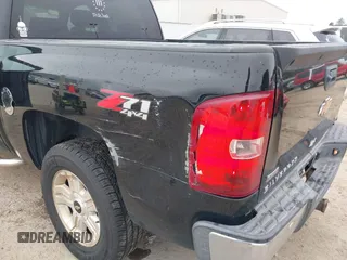 2011 Chevrolet Silverado 1500 LTZ with VIN 3GCPKTE2XBG110413, listed as a IAAI auction lot 41596989 with 158,214 mi miles and . Bid and sale history available at DreamBid. Image 6.