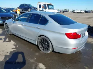 2013 BMW 5 Series 535i xDrive with VIN WBAFU7C56DDU71466, listed as a IAAI auction lot 41867028 with 106,149 mi miles and . Bid and sale history available at carsss.com. Image 3.