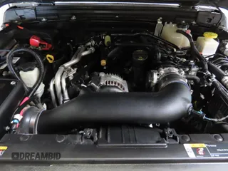 2023 Jeep Gladiator Freedom z VIN 1C6HJTAG2PL519578, wystawiony jako Copart lot #58429715 z przebiegiem 41 914 mil mil oraz Szkoda całkowita • Salvage title. Historia ofert i sprzedaży dostępna na DreamBid. Obrazek 7.