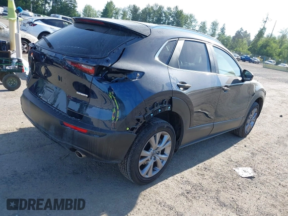 2023 Mazda CX-30 S Select with VIN 3MVDMBBM4PM558831, listed as a IAAI auction lot 42432750 with 12,468 mi miles and . Bid and sale history available at DreamBid. Image 4.
