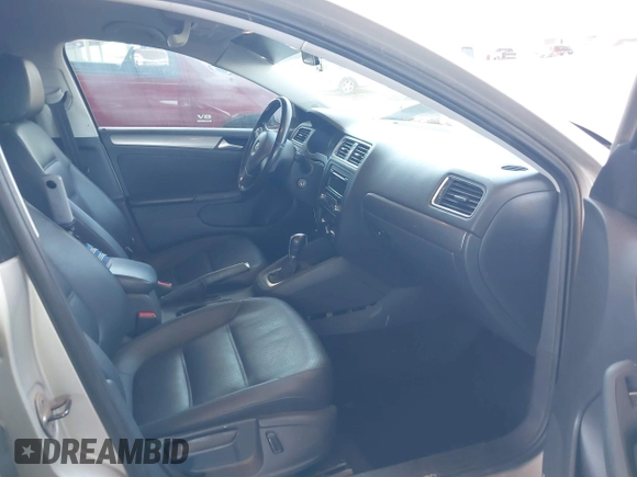 2014 Volkswagen Jetta TDI w/Premium with VIN 3VWLL7AJ1EM228062, listed as a IAAI auction lot 42256650 with 218,955 mi miles and . Bid and sale history available at DreamBid. Image 5.