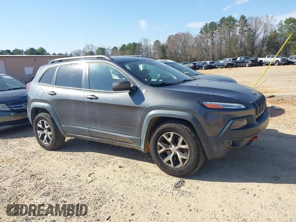 2014 Jeep Cherokee Trailhawk with VIN 1C4PJMBS6EW278987, listed as a IAAI auction lot 41789868 with 136,696 mi miles. Bid and sale history available at carsss.com. Image 1.
