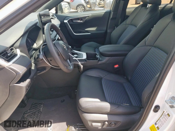 2023 Toyota RAV4 Hybrid XSE with VIN 2T3E6RFV5PW043640, listed as a Copart auction lot 64097125 with 13,686 mi miles and Salvage title. Bid and sale history available at DreamBid. Image 7.