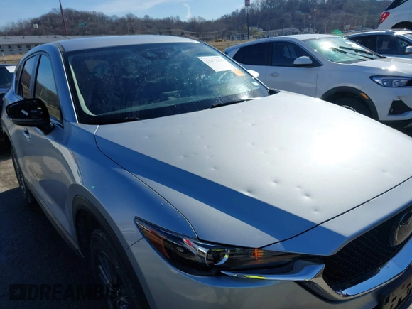 2019 Mazda CX-5 Touring with VIN JM3KFACM8K1602886, listed as a IAAI auction lot 41472201 with 28,431 mi miles. Bid and sale history available at carsss.com. Image 6.