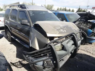 2001 Nissan Xterra XE with VIN 5N1ED28T91C541628, listed as a Copart auction lot 57712125 with 104,738 mi miles and Salvage title. Bid and sale history available at DreamBid. Image 4.