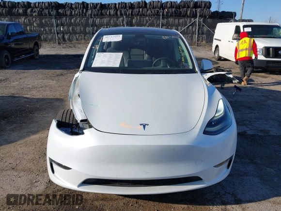 2023 Tesla Model Y Long Range z VIN 7SAYGDEE5PF765326, wystawiony jako IAAI lot #41757113 z przebiegiem 10 461 mil mil oraz . Historia ofert i sprzedaży dostępna na DreamBid. Obrazek 13.