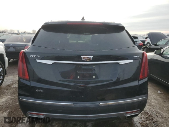 2021 Cadillac XT5 AWD Premium Luxury with VIN 1GYKNDRS9MZ141571, listed as a Copart auction lot 46450135 with 92,668 mi miles and Salvage Title. Bid and sale history available at carsss.com. Image 6.