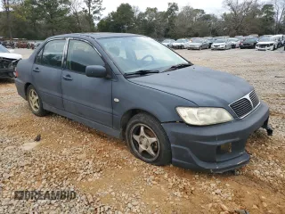 2003 Mitsubishi Lancer OZ-Rally with VIN JA3AJ86E33U079131, listed as a Copart auction lot 88582825 with 213,593 mi miles and Salvage Title. Bid and sale history available at carsss.com. Image 4.