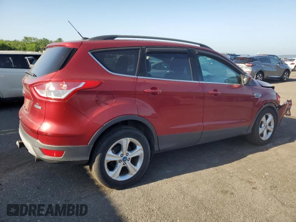 2013 Ford Escape SE with VIN 1FMCU0G97DUC07677, listed as a Copart auction lot 60247335 with 51,141 mi miles and Salvage title. Bid and sale history available at DreamBid. Image 3.