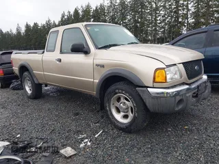 2002 Ford Ranger XL z VIN 1FTZR15E92PB61299, wystawiony jako IAAI lot #41471659 z przebiegiem 156 466 mil mil oraz . Historia ofert i sprzedaży dostępna na DreamBid. Obrazek 1.