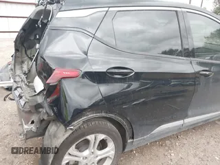 2020 Chevrolet Bolt EV LT z VIN 1G1FY6S08L4106463, wystawiony jako IAAI lot #42172094 z przebiegiem Nie podano mil oraz . Historia ofert i sprzedaży dostępna na DreamBid. Obrazek 22.