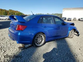 2012 Subaru Impreza Sedan WRX WRX STI with VIN JF1GV8J69CL023562, listed as a Copart auction lot 74596284 with 0 mi miles and Salvage Title. Bid and sale history available at carsss.com. Image 3.