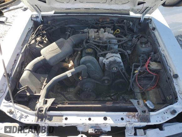 1989 Ford Mustang z VIN 1FABP40A3KF309892, wystawiony jako Copart lot #80858704 z przebiegiem 75 267 mil mil oraz Czysty tytuł • Clean title. Historia ofert i sprzedaży dostępna na DreamBid. Obrazek 11.