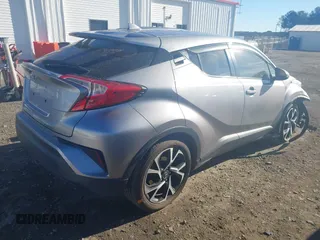 2018 Toyota C-HR XLE with VIN NMTKHMBX3JR048303, listed as a IAAI auction lot 41695246 with 125,081 mi miles. Bid and sale history available at carsss.com. Image 4.