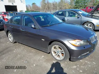 2008 BMW 3 Series 328xi with VIN WBAVC93518K043073, listed as a IAAI auction lot 42134507 with 148,712 mi miles. Bid and sale history available at carsss.com. Image 1.