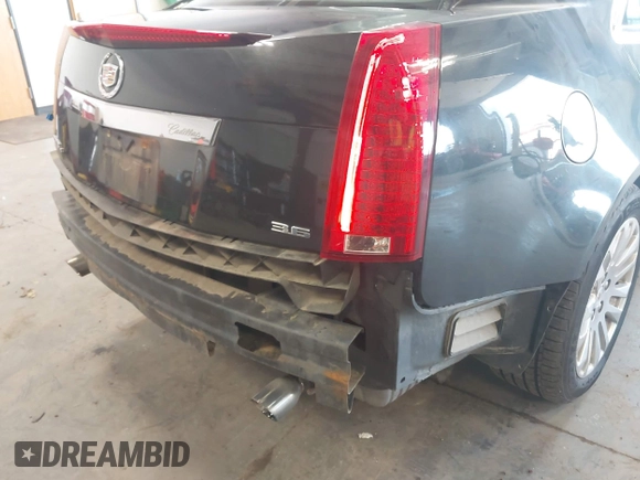 2011 Cadillac CTS Performance with VIN 1G6DL5ED6B0131490, listed as a IAAI auction lot 41980231 with 75,040 mi miles and . Bid and sale history available at DreamBid. Image 6.