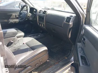 2010 GMC Canyon with VIN 1GTKTFDE9A8145906, listed as a IAAI auction lot 41921735 with 137,304 mi miles and . Bid and sale history available at DreamBid. Image 5.