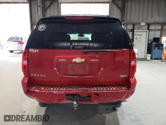 2011 Chevrolet Tahoe LS with VIN 1GNSCAE00BR320455, listed as a Copart auction lot 54782325 with 202,936 mi miles and Salvage title. Bid and sale history available at DreamBid. Image 6.