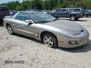 2001 Pontiac Firebird Firebird z VIN 2G2FS22KX12132170, wystawiony jako Copart lot #57558535 z przebiegiem Nie podano mil oraz Tytuł czysty. Historia ofert i sprzedaży dostępna na DreamBid. Obrazek 4.