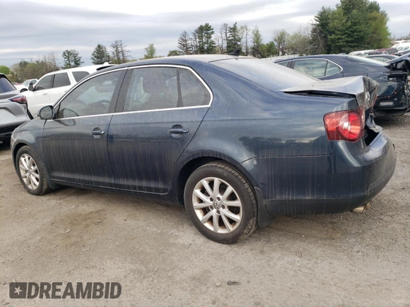 2010 Volkswagen Jetta Limited Edition with VIN 3VWRZ7AJ6AM032265, listed as a Copart auction lot 53852485 with 118,996 mi miles and Salvage title. Bid and sale history available at DreamBid. Image 2.