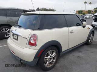 2011 MINI Hardtop with VIN WMWSU3C56BT093403, listed as a IAAI auction lot 42795188 with 123,454 mi miles and . Bid and sale history available at DreamBid. Image 4.