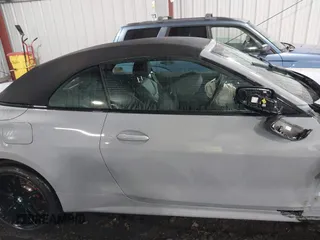 2024 BMW 4 Series 430i xDrive with VIN WBA43AT00RCN83317, listed as a IAAI auction lot 41211849 with 12,000 mi miles and . Bid and sale history available at DreamBid. Image 14.