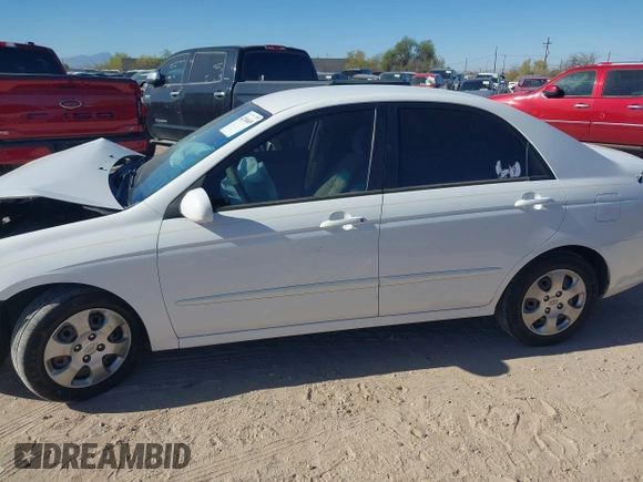 2009 Kia Spectra EX with VIN KNAFE222695588022, listed as a IAAI auction lot 42106609 with 153,688 mi miles. Bid and sale history available at carsss.com. Image 14.