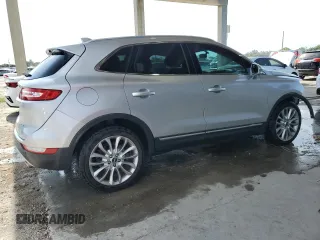 2017 Lincoln MKC Reserve with VIN 5LMCJ3C99HUL14684, listed as a Copart auction lot 58817385 with 77,005 mi miles and Salvage title. Bid and sale history available at DreamBid. Image 3.