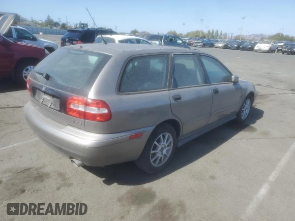 2004 Volvo V40 z VIN YV1VW27564F038086, wystawiony jako Copart lot #69464094 z przebiegiem 223 544 mil mil oraz Czysty tytuł • Clean title. Historia ofert i sprzedaży dostępna na DreamBid. Obrazek 3.
