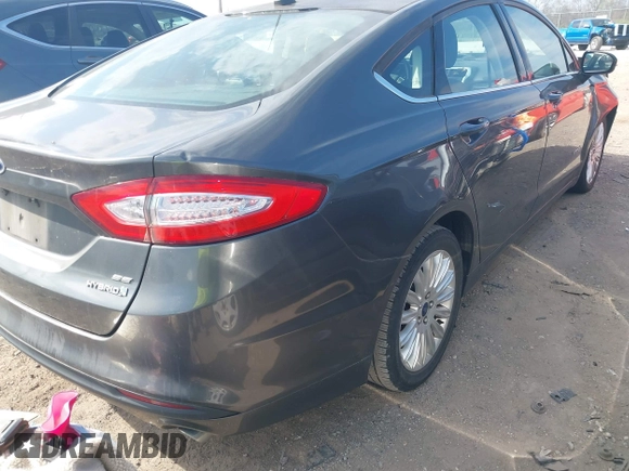 2016 Ford Fusion SE Hybrid with VIN 3FA6P0LU7GR218781, listed as a IAAI auction lot 41844791 with 214,867 mi miles. Bid and sale history available at carsss.com. Image 4.