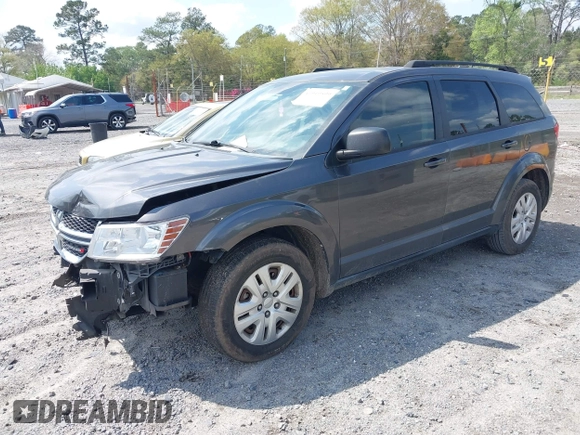 2017 Dodge Journey SE with VIN 3C4PDCABXHT538885, listed as a IAAI auction lot 41919599 with 170,311 mi miles and . Bid and sale history available at DreamBid. Image 2.