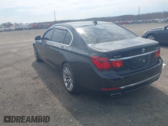 2015 BMW 7 Series 740Li xDrive with VIN WBAYF4C55FD874116, listed as a IAAI auction lot 41877144 with 156,280 mi miles. Bid and sale history available at carsss.com. Image 3.